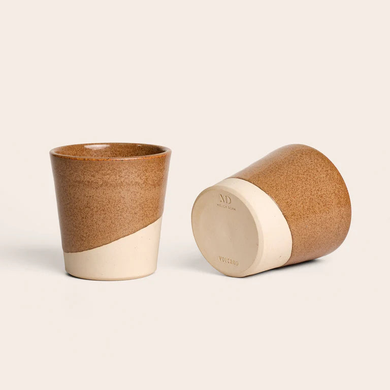Brown ceramic coffee cup